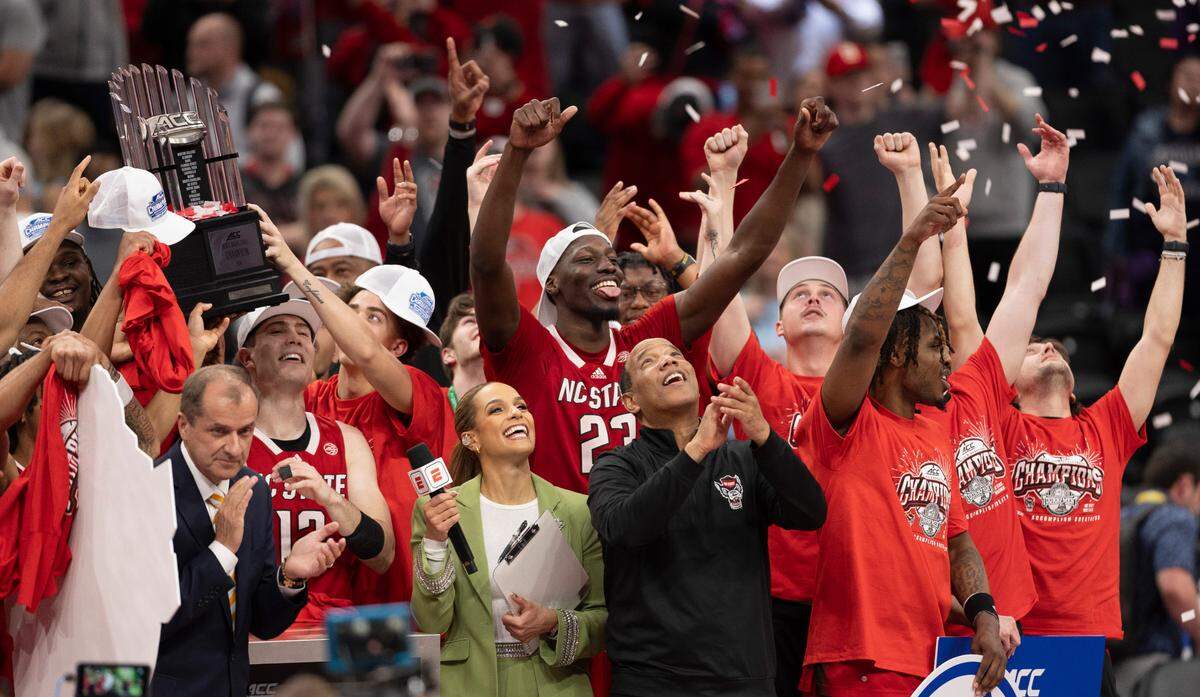 N.C. State coach Kevin Keatts celebrates the Wolfpack’s ACC Tournament Championship wit his team following their 84-76 victory over North Carolina at Capitol One Arena on Saturday, March 16, 2024 in Washington, D.C.