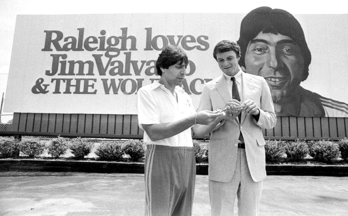 Raleigh Mayor Smedes York presents Jim Valvano with the key to the city of Raleigh in May, 1983. The key was presented to Coach Valvano after he led the Wolfpack to the National Championship.