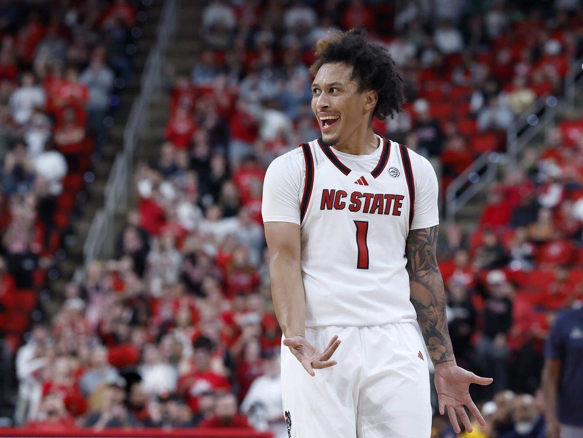 N.C. State’s Darrion Williams reacts after knocking down a three-point basket during the second half of the Wolfpack’s 110-64 win over UNC Greensboro on Wednesday, Nov. 12, 2025, at Lenovo Center in Raleigh, N.C.