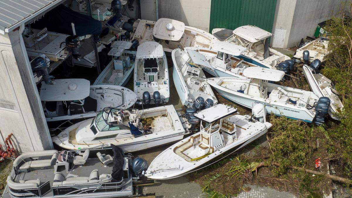 Boats are stacked up against the Port Sanibel Marina Hotel after Hurricane Ian ran through the areaThursday, Sept. 29, 2022, in Fort Meyers, Fla.