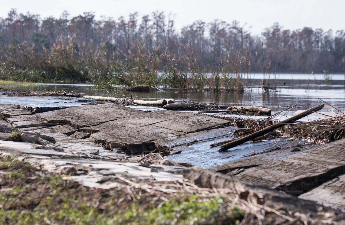 The earthen berm around Sutton Lake, which contained coal ash from a nearby coal ash pond, collapsed in many places due to the aftermath of Hurricane Florence.