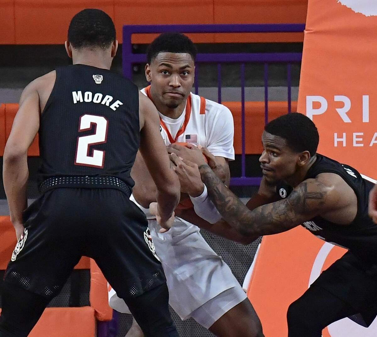 Clemson senior guard Clyde Trapp(0) makes the last rebound of the game as time expires in overtime January 5, 2021.