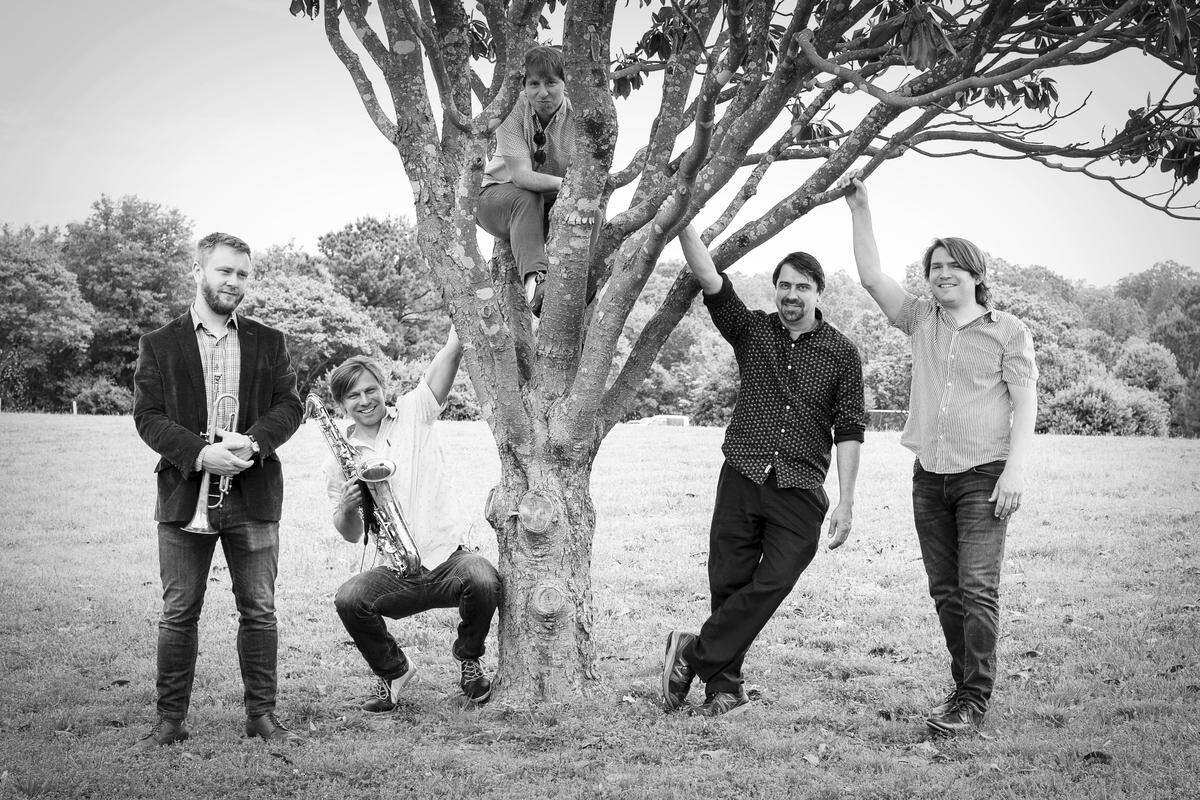 Peter Lamb and the Wolves are a Raleigh-based jazz quintet, consisting of band leader Peter Lamb on saxophone; Mark Wells on keyboard and vocals; Paul Rogers, Peter’s younger brother on trumpet; Peter Kimosh on upright bass; and Stephen Coffman on drums.