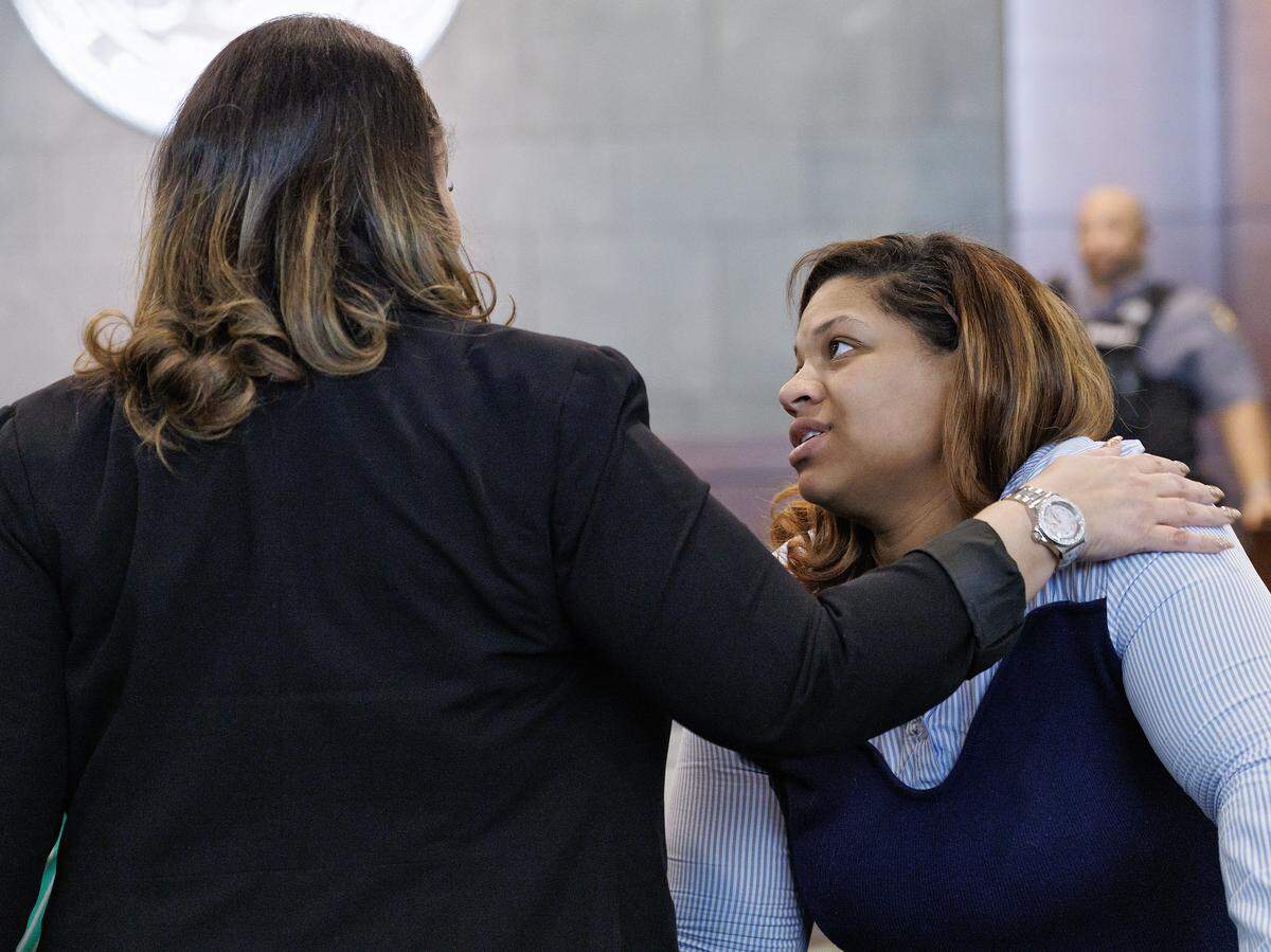 Akira Montague, right, talks with her mother, Veneta Sydnor, after a judge in Durham County Superior Court on Tuesday, March 24, 2026, ordered Brenay Kennard to pay $40,000 while Kennard appeals a judgment ordering her to pay $1.75 million in damages. Kennard filed a motion to stay the enforcement of a November 2025 order for her to pay Montague for alienation of affection and criminal conversation.