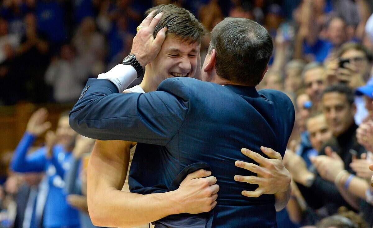 Duke’s Grayson Allen (3) gets a hug from head coach Mike Krzyzewski as he leaves the court in Cameron Indoor Stadium for the last time as the Blue Devils defeated UNC 74-64 at Cameron Indoor Stadium In Durham, N.C. Saturday, March 3, 2018.