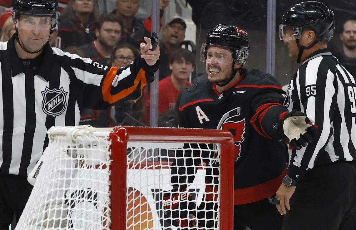 Carolina’s Sebastian Aho (20) can’t believe he was called for a penalty in the first period of the Carolina Hurricanes’ game against the Florida Panthers in Game 1 of the Eastern Conference Finals at the Lenovo Center in Raleigh, N.C., Tuesday, May 20, 2025.