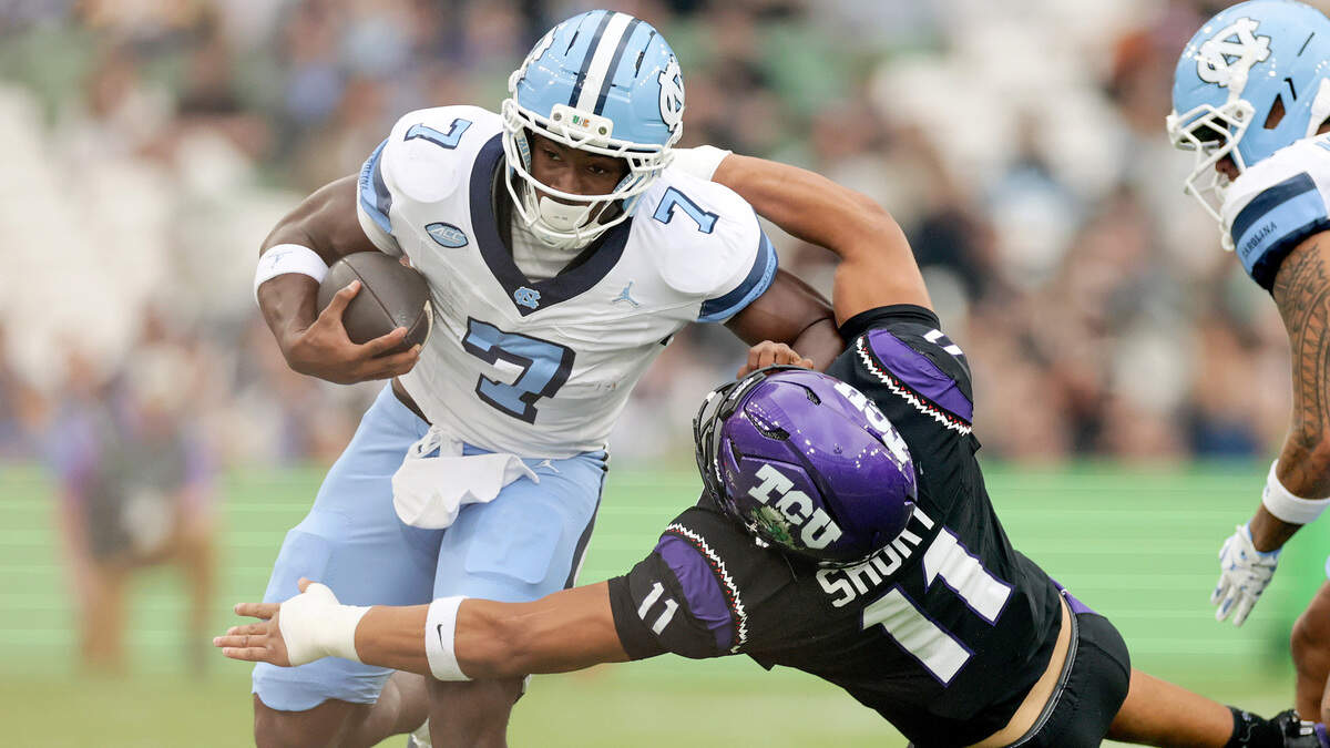 UNC football kicks off season vs. TCU in Week 0 game. See photos from Ireland