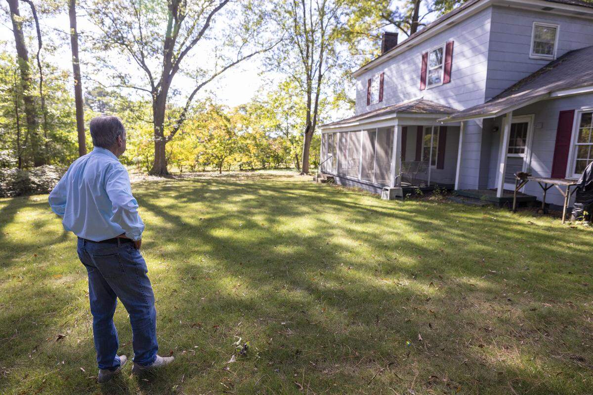 Larry King, 87, is leading a coalition of residents opposing a proposed three-story, 60-unit affordable housing apartment building next to his home in the Avent West neighborhood in southwest Raleigh. The project is being approved without a public hearing under Raleigh’s “missing middle” zoning code.