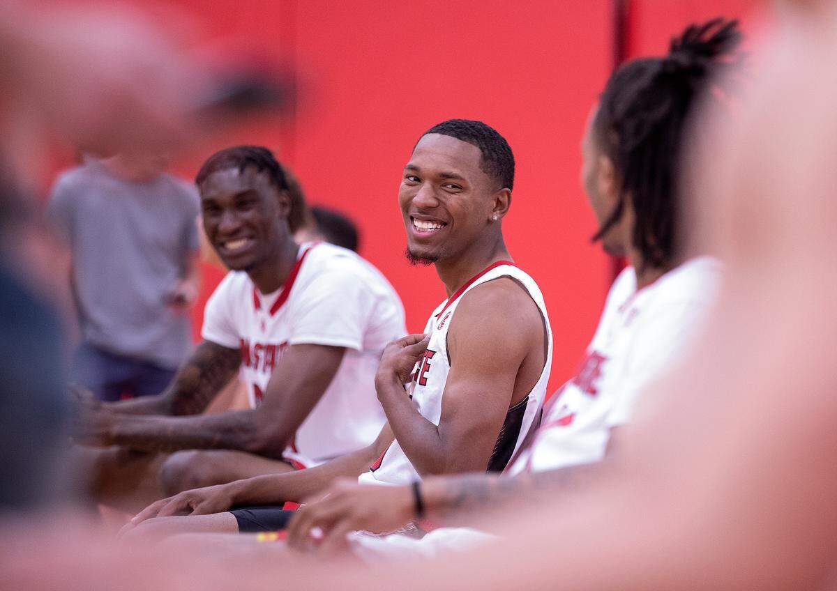 Players gather for N.C. State men’s basketball media day on Thursday, Sept. 21, 2023, in Raleigh, N.C.