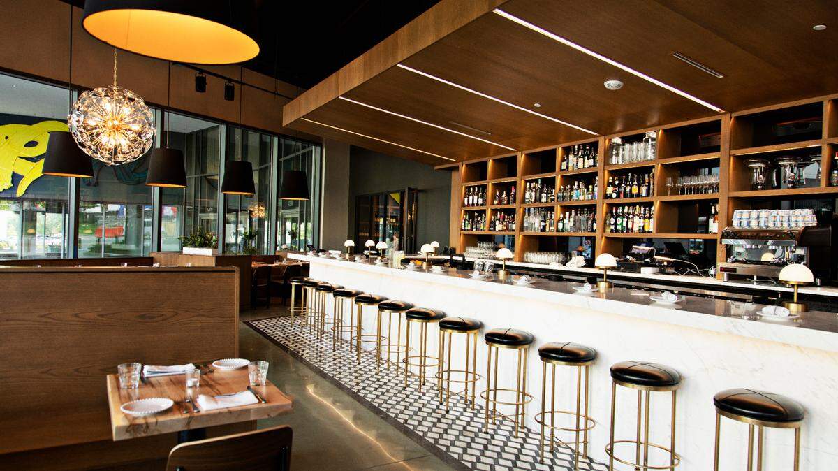 The marble bar serves as an anchor when you step inside Cucciolo Terrazza in Raleigh’s North Hills.