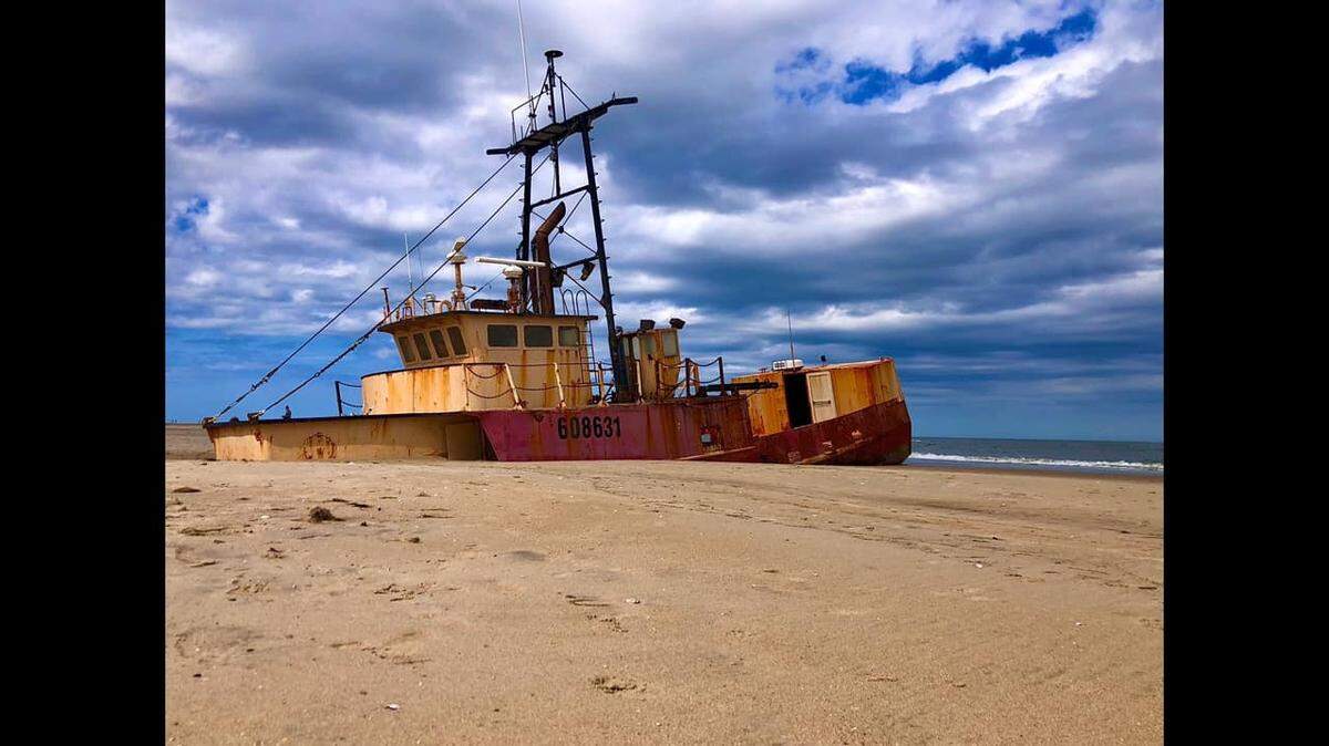 The Ocean Pursuit, also known as Cameron Scott, has been grounded long enough to become a tourist attraction and favorite spot for photographers.