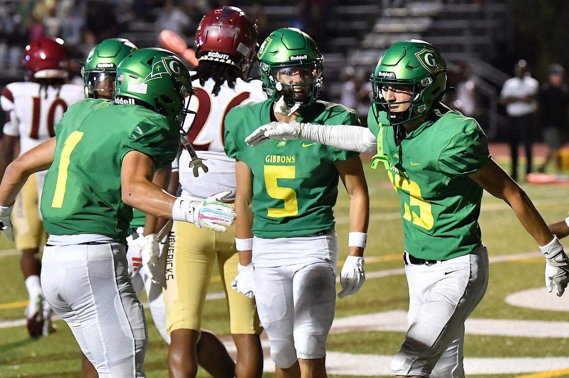Cardinal Gibbons wide receiver Connor McGeehan (13) celebrates his touchdown against Mallard Creek with Brayden Karras (1) during the fourth quarter. The Mallard Creek Mavericks and the Cardinal Gibbons Crusaders met in a non-conference football game in Raleigh, N.C. September 19, 2025