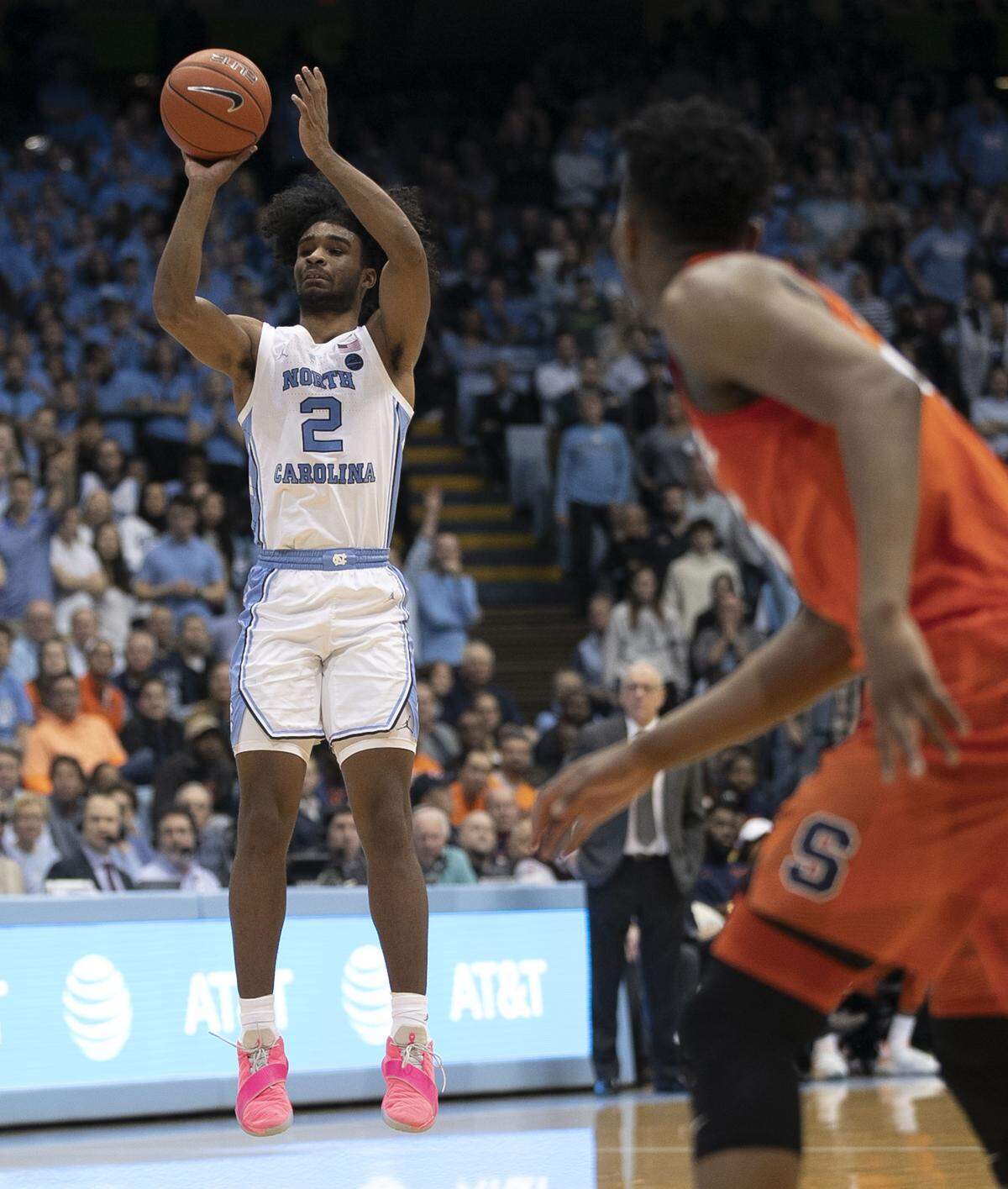 North Carolina’s Coby White (2) launches a there-point shot in the second half against Syracuse on Tuesday, February 26, 2019 at the Smith Center in Chapel Hill, N.C. White was 6-11 from the three-point line leading North Carolina with 34 points in the Tar Heels’ 93-85 victory.
