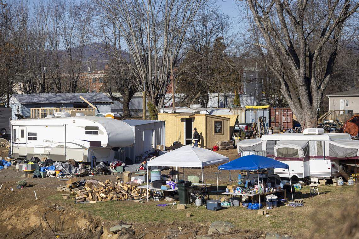 A variety of housing options, travel trailers included, stand along the Swannanoa River in December 2024. The unincorporated community of Swannanoa was severely damaged by flooding.