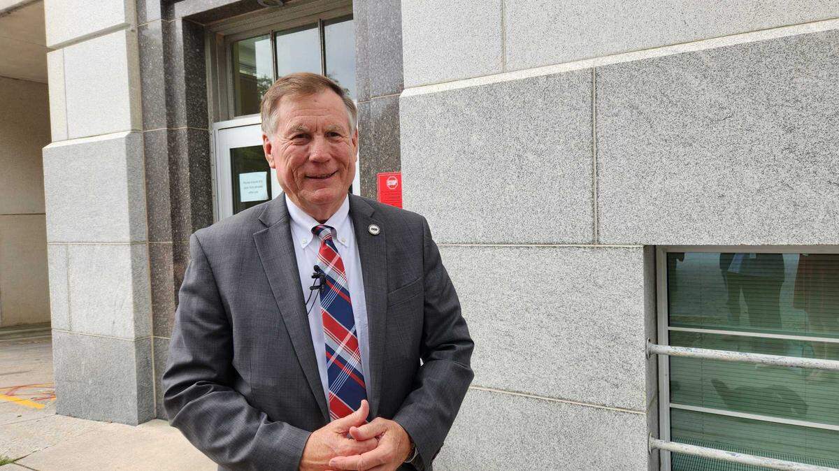 N.C. Insurance Commissioner Mike Causey talks to reporters about storm preparedness after a Council of State meeting on Tuesday, Aug. 6, 2024.