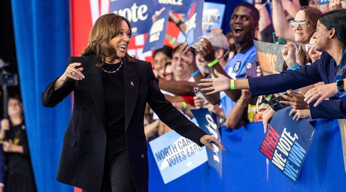 Vice President Kamala Harris takes the stage during a rally at Coastal Credit Union Music Park at Walnut Creek in Raleigh on Wednesday, Oct. 30, 2024.