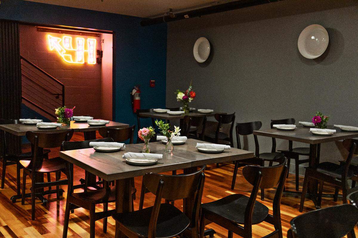 An upstairs dining area at Young Hearts Distilling Company in downtown Raleigh on Wednesday, Aug. 12, 2021, in advance of officially opening. Young Hearts will combine a bar and food program in addition to distilling four spirits to start in the former Busy Bee space.