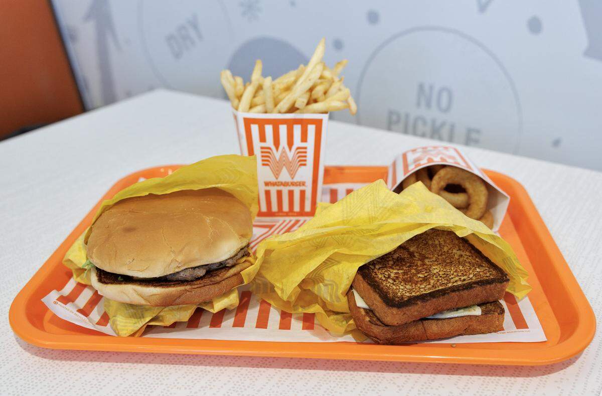 A Whataburger, french fries, onion rings and a Patty Melt are pictured at Whataburger in Mebane on Monday, Dec. 15, 2025. The new restaurant is the chain’s 11th in North Carolina.