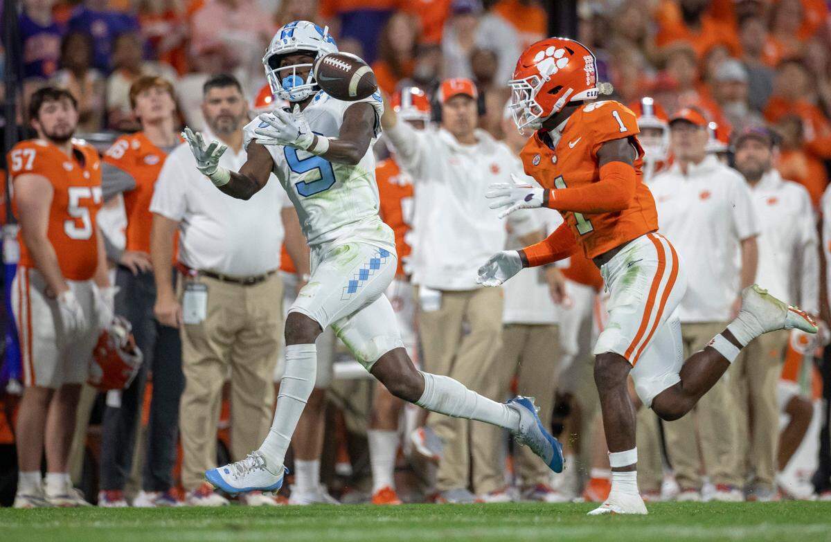 Clemson’s Andrew Mukuba (1) defends North Carolina’s Devontez Walker (9) on a deep pass from quarterback Drake Maye that Walker could not handle, in the third quarter on Saturday, November 18, 2023 at Memorial Stadium in Clemson, S.C.