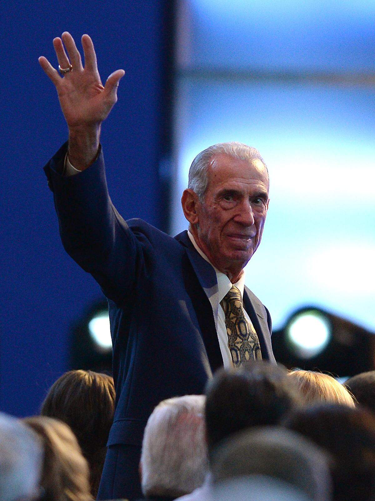 Former NASCAR driver and Hall of Fame member Ned Jarrett waves at the crowd in 2016. 