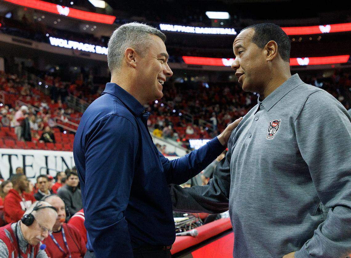 Virginia head coach Tony Bennett and N.C. State head coach Kevin Keatts share a word prior to the Wolfpack’s 76-60 win on Saturday, Jan. 6, 2024, at PNC Arena in Raleigh, N.C.