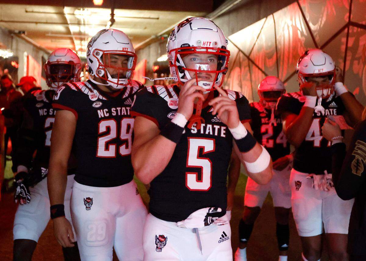 N.C. State wide receiver Thayer Thomas (5) gets ready to head out onto the field to warmup before N.C. State’s game against Virginia Tech at Carter-Finley Stadium in Raleigh, N.C., Thursday, Oct. 27, 2022.
