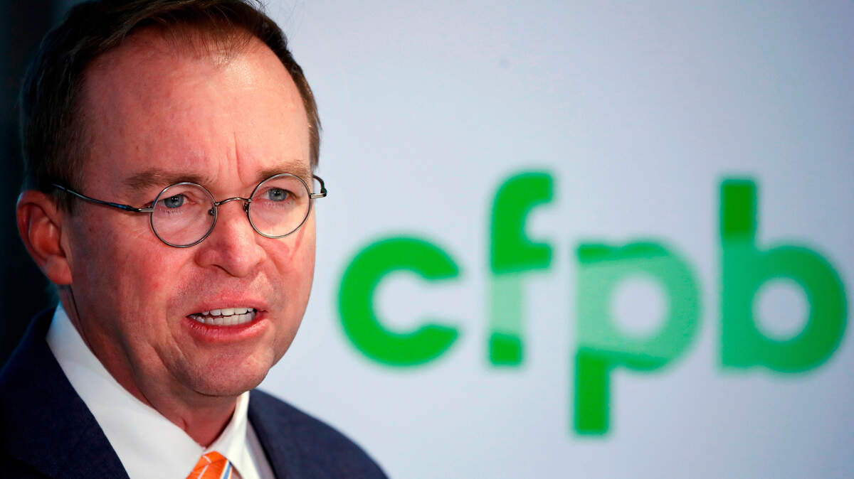 In this Nov. 27, 2017, file photo, Mick Mulvaney speaks during a news conference after his first day as acting director of the Consumer Financial Protection Bureau in Washington. Mulvaney promised to shrink the bureau’s mandate and take a much softer approach to enforcement, and records reviewed by The Associated Press indicate he has kept his word.