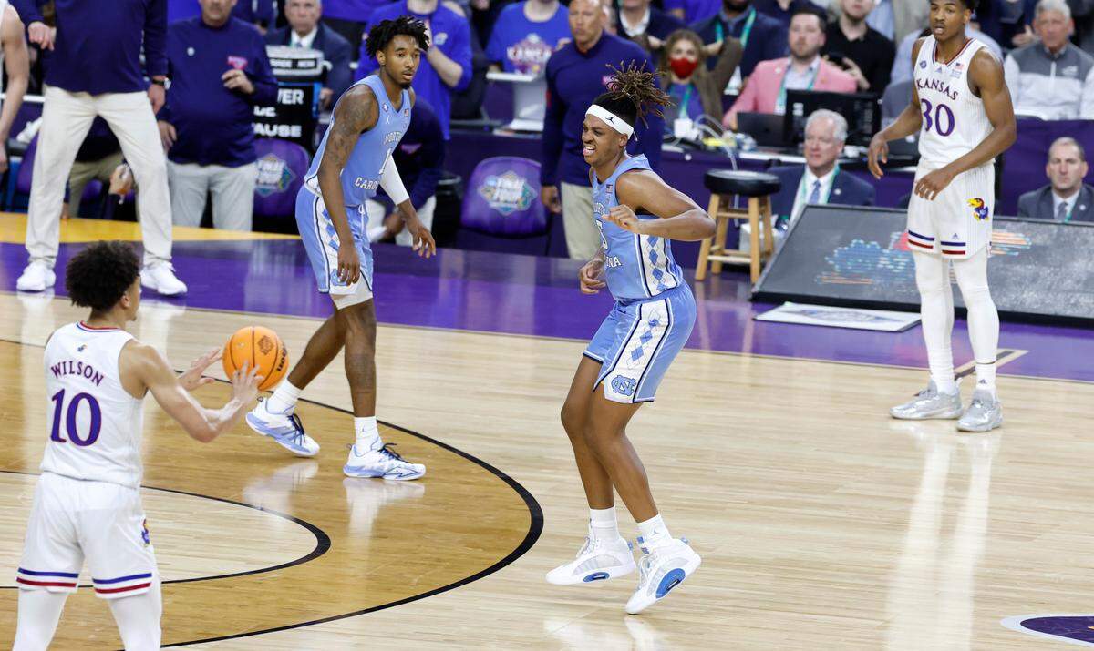North Carolina’s Armando Bacot (5) continues to try to play after being injured late in the second half of Kansas’ 72-69 victory over UNC in the NCAA Men’s National Championship at the Caesars Superdome in New Orleans, La., Monday, April 4, 2022.