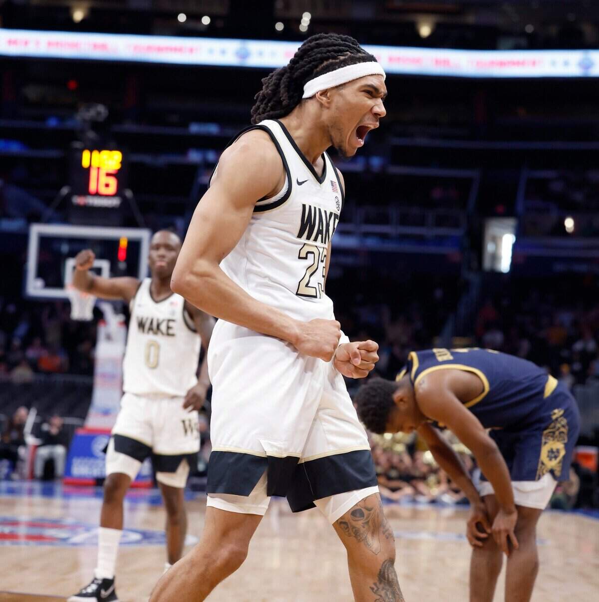 Wake Forest’s Hunter Sallis (23) celebrates after making the basket while being fouled during the first half of Wake Forest’s game against Notre Dame in the second round of the 2024 ACC Men’s Basketball Tournament at Capital One Arena in Washington, D.C., Wednesday, March 13, 2024.