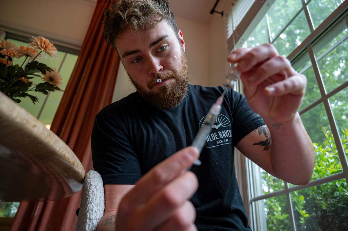 Zan takes his testosterone shots weekly in his home. Although there is still anxiety surrounding administering the shots, he is grateful for the changes that allow him to look and feel more like himself. “Since transitioning, I feel like a lot more confident and comfortable,” he said.