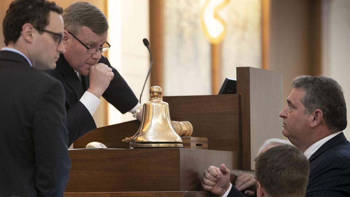 House speaker Tim Moore confers with Rep. David Lewis prior to the afternoon session of the House on Wednesday, September 11, 2019 at the General Assembly in Raleigh, N.C. Lewis and Moore were both questioned by House democrats about the override vote of the Governor’s veto of the budget during the Wednesday morning session.