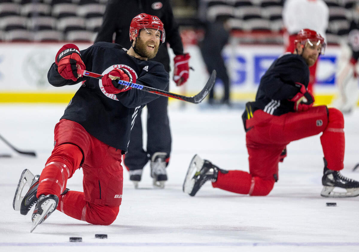 The Carolina Hurricanes Jaccob Slavin (74) shoots from the kneeling position during practice on Wednesday, May 17, 2023 at PNC Arena in Raleigh, N.C.
