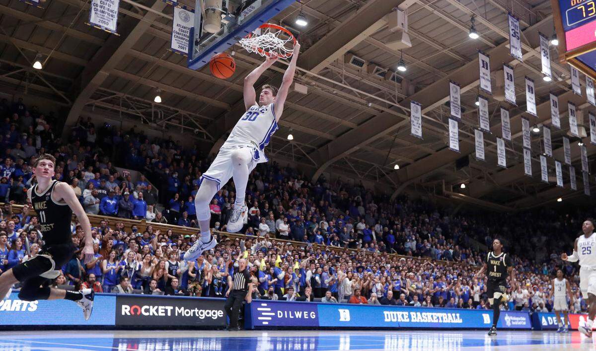 Duke’s Kyle Filipowski (30) slams in two late in the second half during Duke’s 75-73 victory over Wake Forest at Cameron Indoor Stadium in Durham, N.C., Tuesday, Jan. 31, 2023.