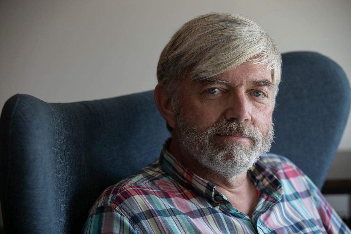 Former WRAL meteorologist Greg Fishel poses for a portrait in home on Tuesday, July 15, 2020 in Raleigh, N.C.