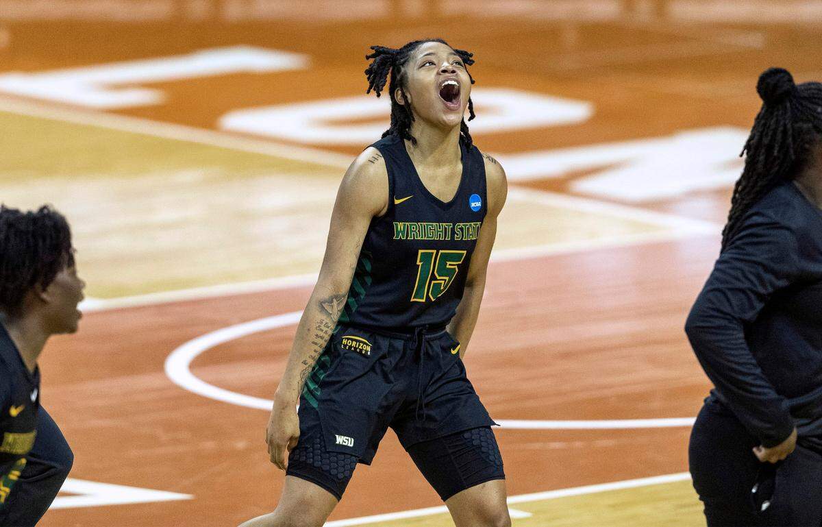 Wright State guard Angel Baker celebrates their win over Arkansas during a college basketball game in the first round of the women’s NCAA tournament at the Frank Erwin Center in Austin, Texas, Monday, March 22, 2021. 