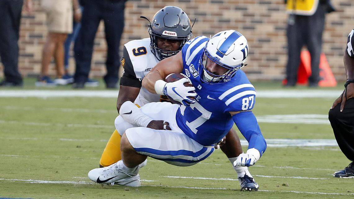 Duke’s Noah Gray (87) gets tied up by North Carolina A&T’s Antoine Wilder (9) during the first half of an NCAA college football game in Durham, N.C., Saturday, Sept. 7, 2019.