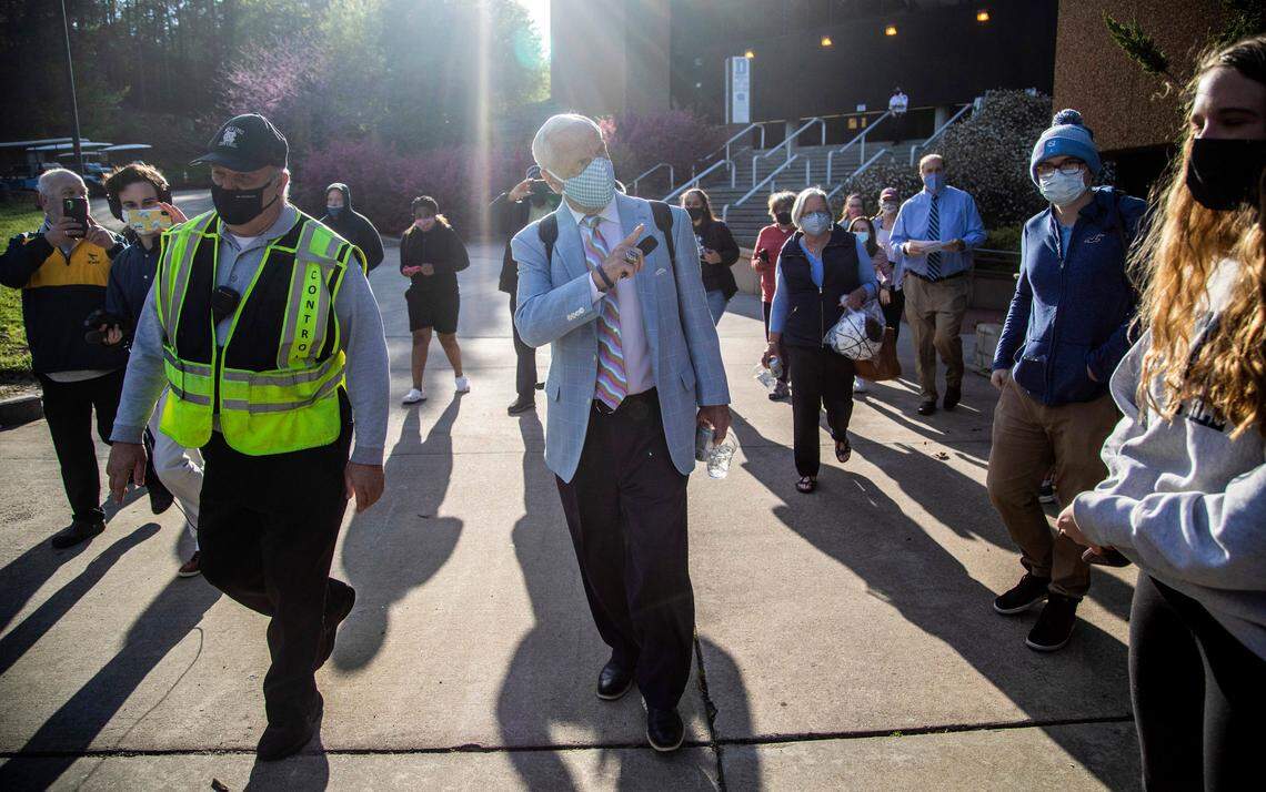 Carolina fans bid farewell as Roy Williams leaves the Dean Smith Center after a press conference announcing his retirement Thursday, April 1, 2021.