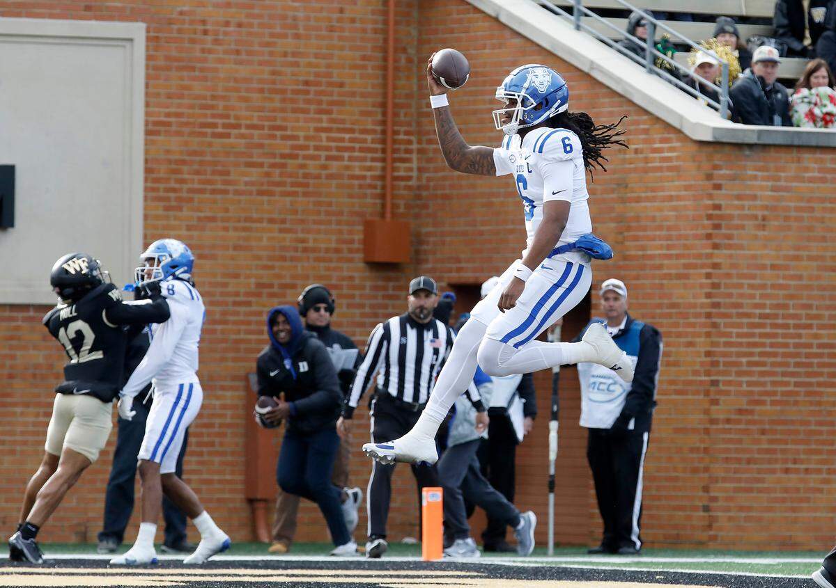 Duke quarterback Maalik Murphy runs the ball into the end zone for a touchdown during the second half of the Blue Devils’ 23-17 win over Wake Forest at Allegacy Stadium on Saturday, Nov. 30, 2024, in Winston-Salem, N.C.