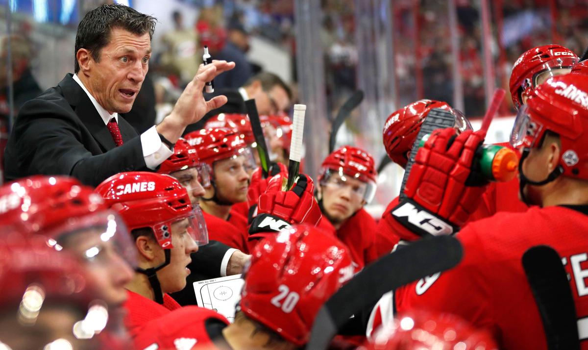 Carolina Hurricanes’ coach Rod Brind’Amour works with his players during his first game as head coach, late in the third period against the New York Islanders on Thursday, October 4, 2018 at PNC Arena in Raleigh, N.C.