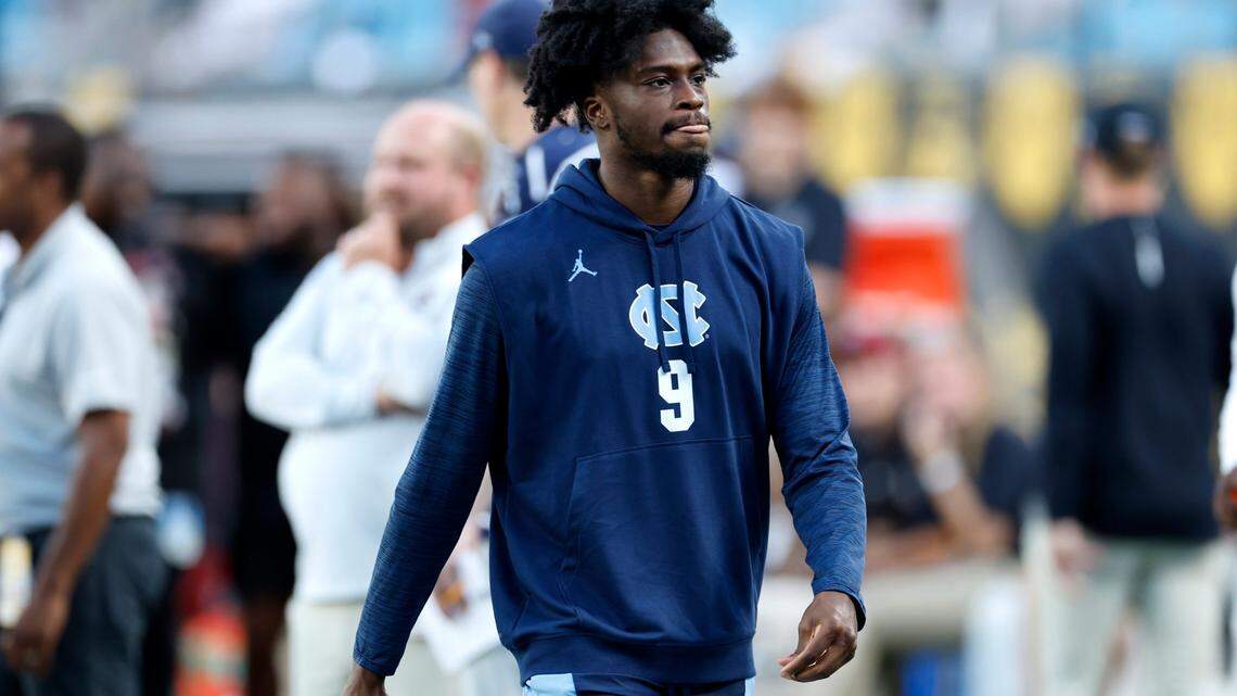 North Carolina wide receiver Tez Walker (9) walks on the field before UNC’s game against South Carolina in the Duke’s Mayo Classic at Bank of America Stadium in Charlotte, N.C., Saturday, Sept. 2, 2023.
