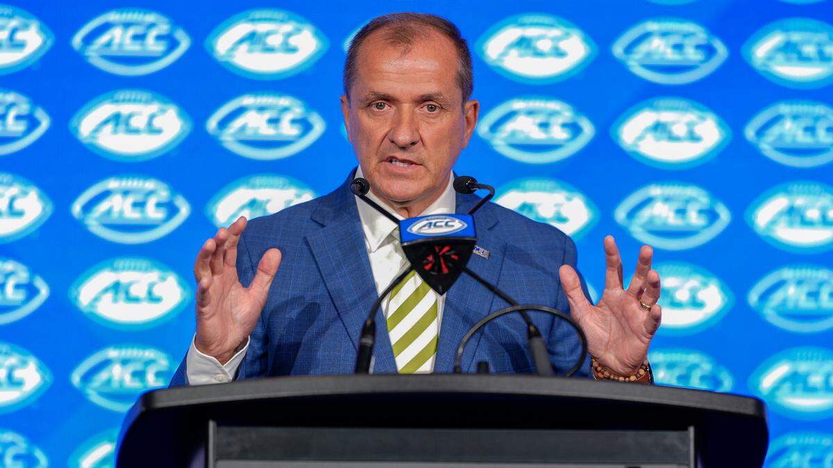 ACC commissioner Jim Phillips speaks to the media during ACC Media Days in Charlotte.
