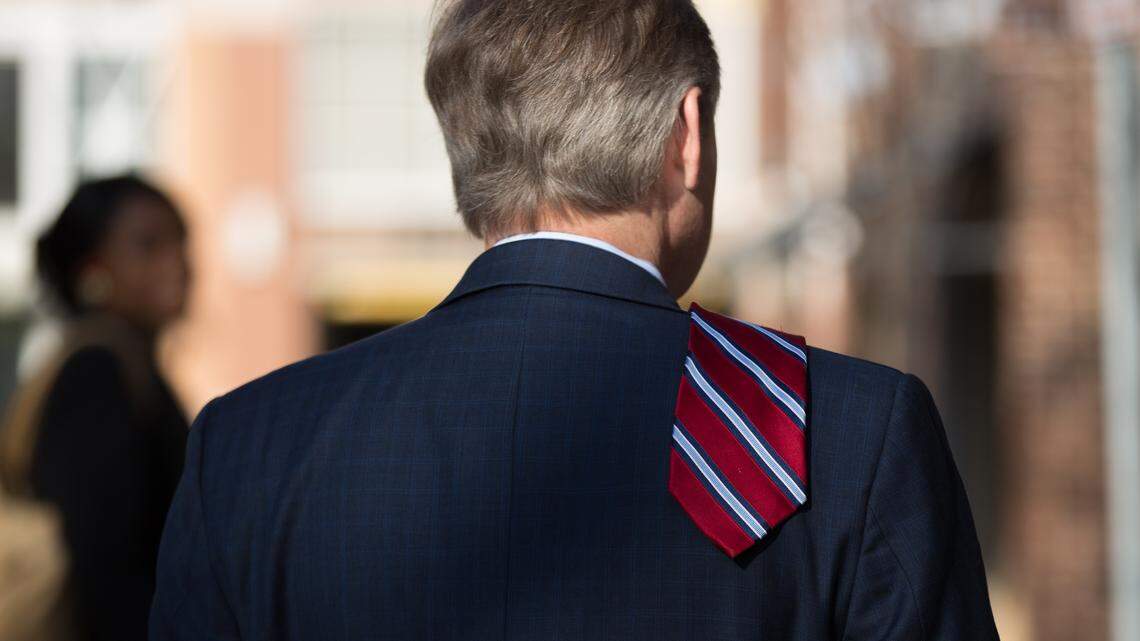 State Rep. Duane Hall waits outside of Market Hall prior to former president Bill Clinton's arrival for a Hillary Clinton for North Carolina campaign event Monday, March 7, 2016 in Raleigh, N.C.