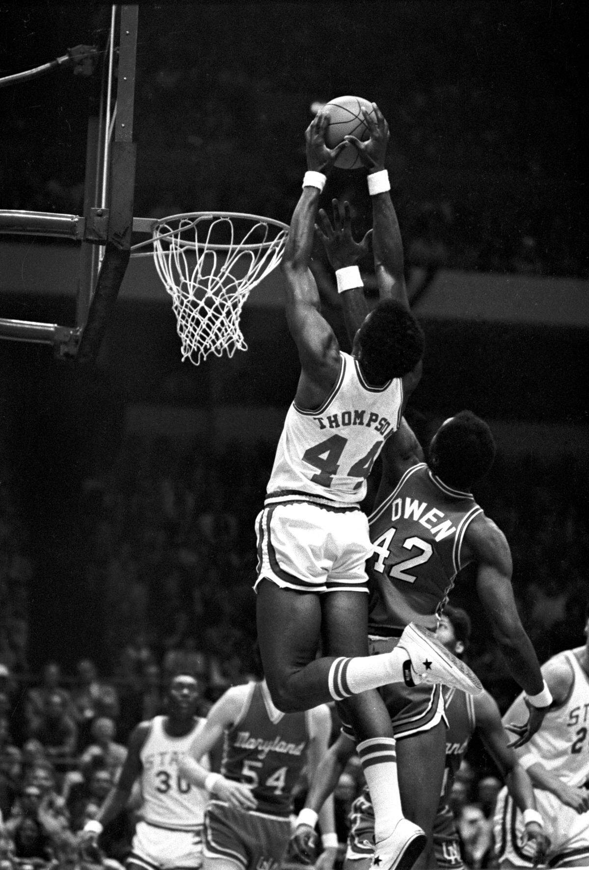 NC State's David Thompson soars above the rim against Maryland in the 1974 ACC Tournament championship game in Greensboro, NC.  