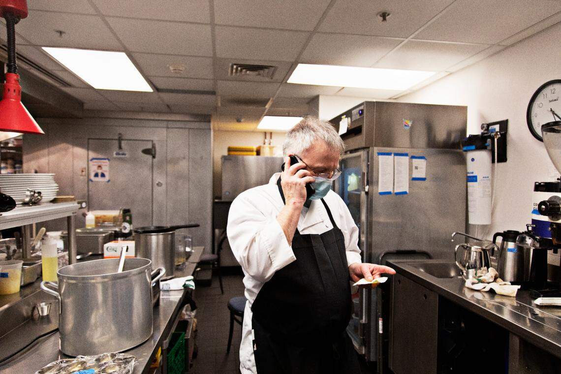 Chef Shane Ingram makes a call about a produce order in the kitchen at The Durham on Thursday, Feb. 24, 2022.