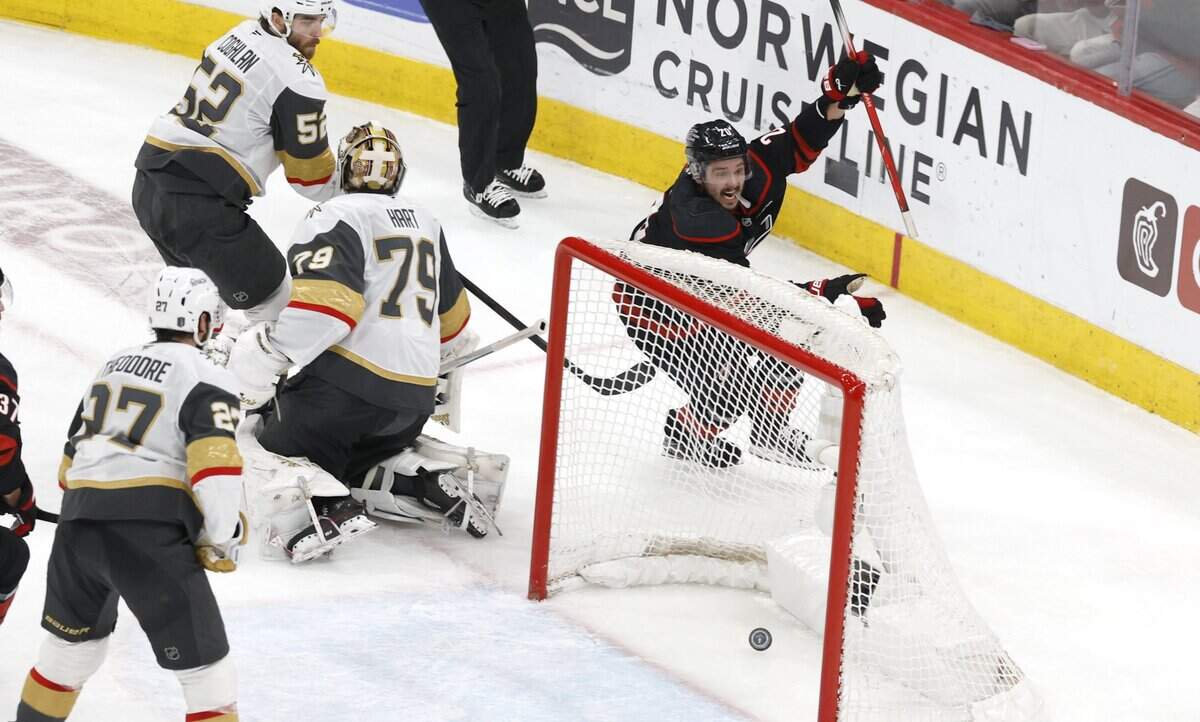 Carolina's Sebastian Aho (20) celebrates after scoring in the second period of the Hurricanes’ game against the Golden Knights on Thursday.
