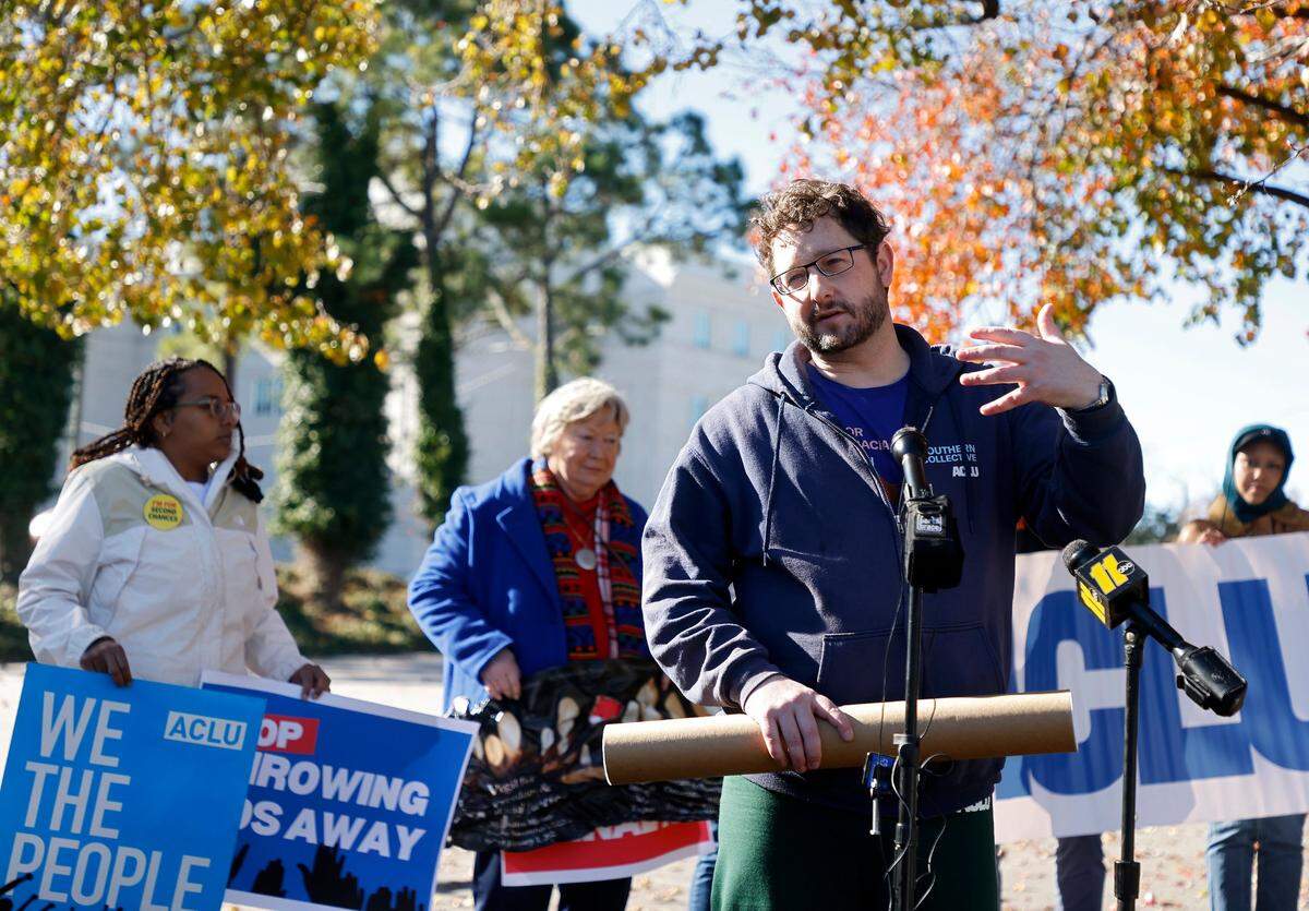 Daniel Bowes, director of policy and advocacy for the ACLU of North Carolina, speaks on the first day of the Vigil for Freedom and Racial Justice outside the Executive Mansion on Thursday, Dec. 1, 2022, in Raleigh, N.C. Community advocates will hold vigil daily outside the Executive Mansion throughout the month of December to call for justice and fair treatment of people incarcerated in North Carolina prisons.