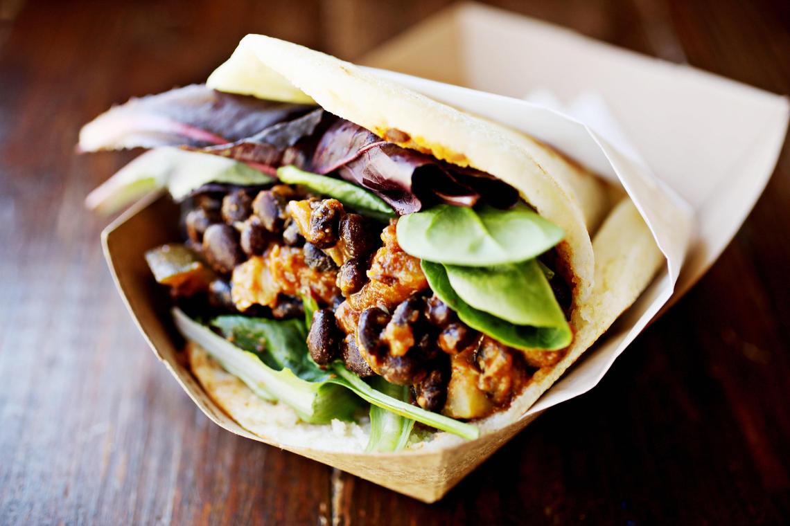 Soul Cocina’s arepa is stuffed with black beans, zucchini, and plantains.