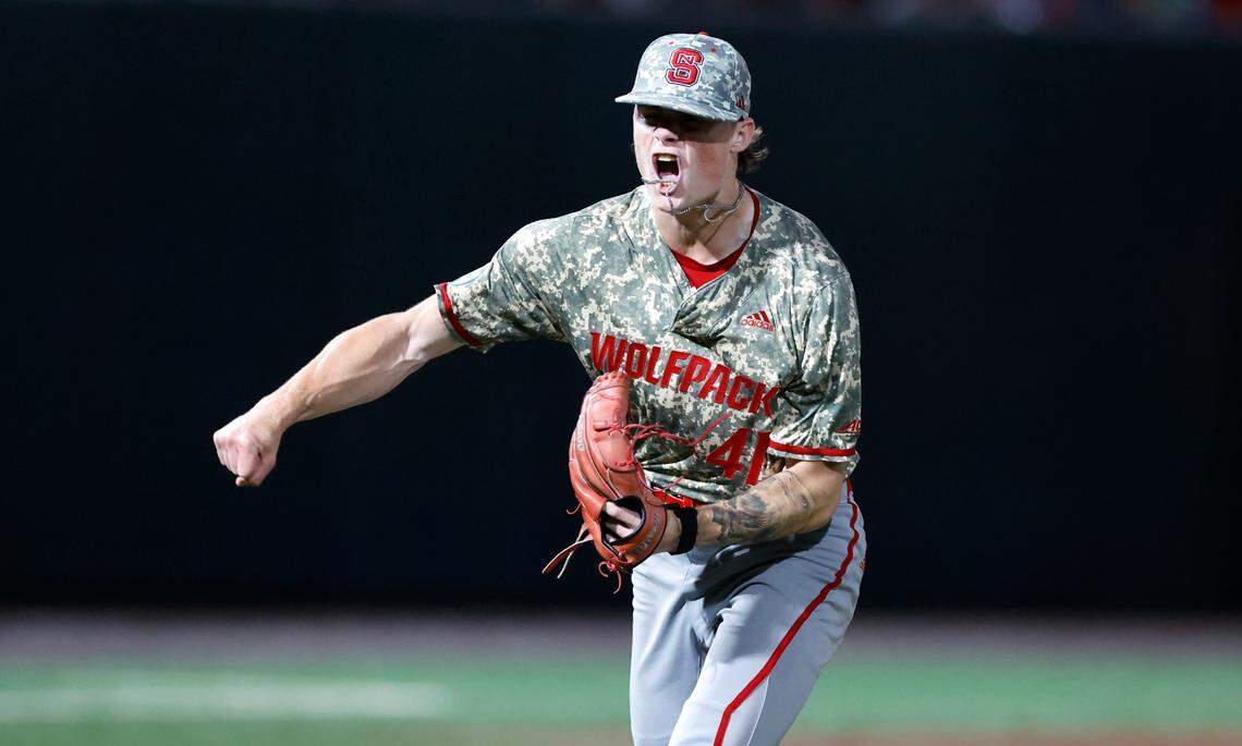 N.C. State’s Jacob Dudan (41) celebrates after striking out JMU’s Brendan O’Donnell to end the eighth inning during N.C. State’s 5-3 victory over James Madison in the NCAA Raleigh Regional final at Doak Field Sunday, June 2, 2024.