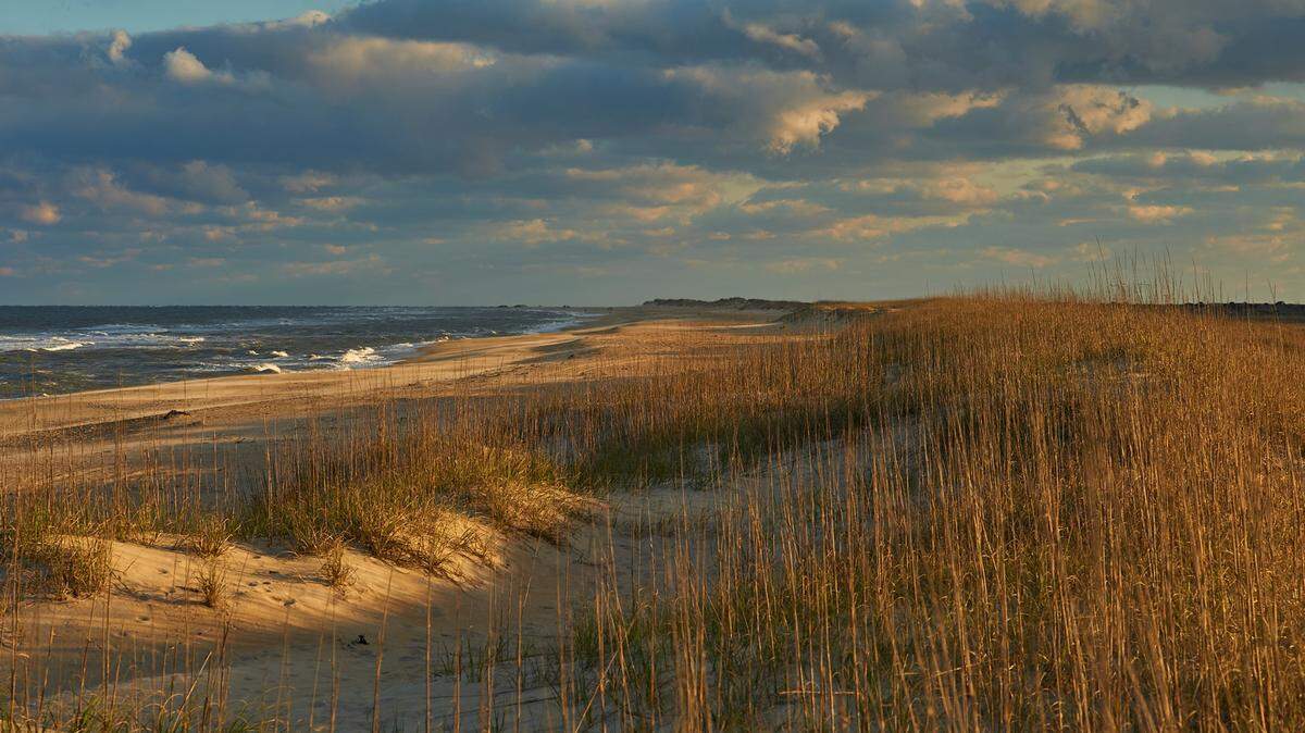 A hole dug in the side of a sand dune at Cape Hatteras National Seashore collapsed on a teen, killing him, the national park says.