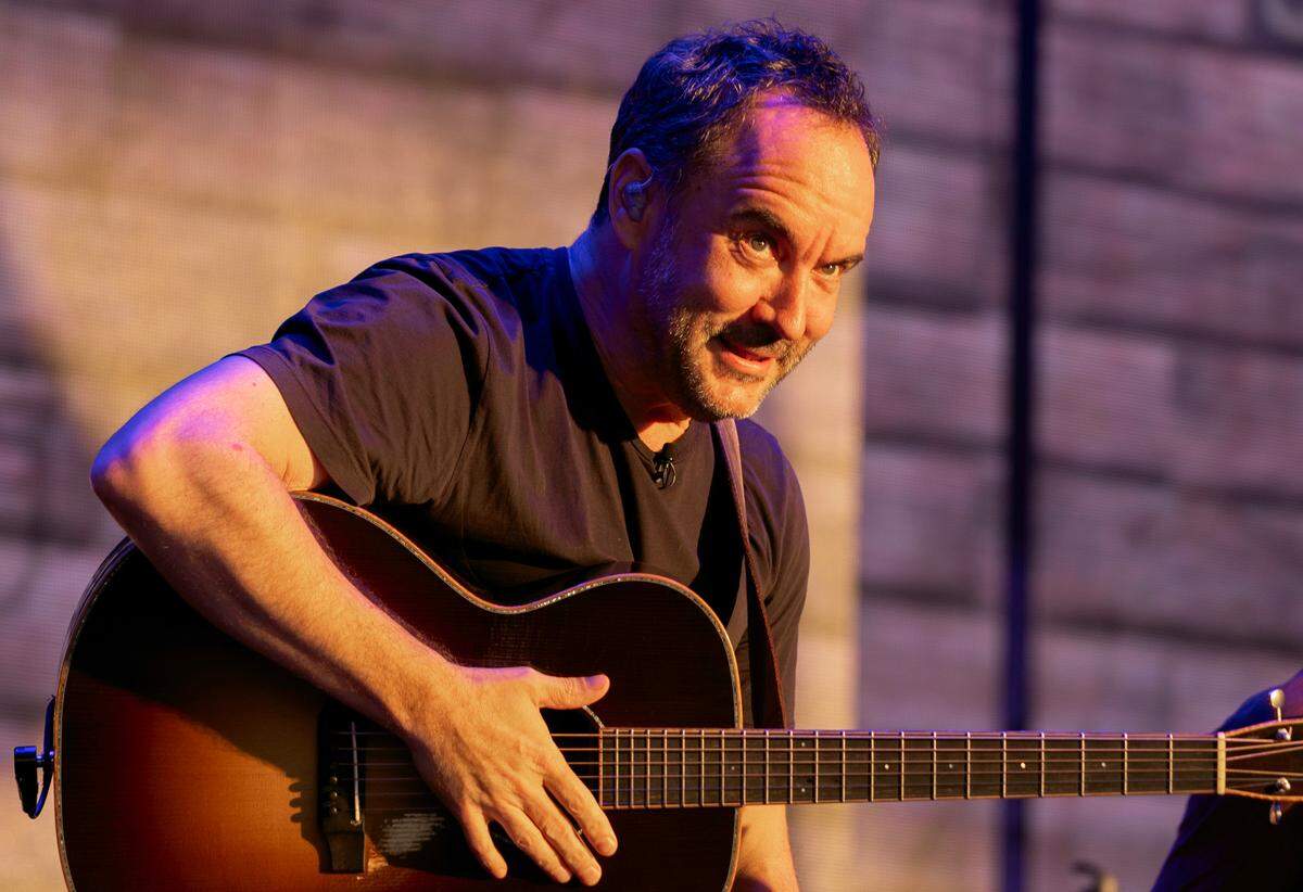 Dave Matthews peers out at the near-capacity crowd at Raleigh, N.C.’s Coastal Credit Union at Walnut Creek, Friday night, June 14, 2024.